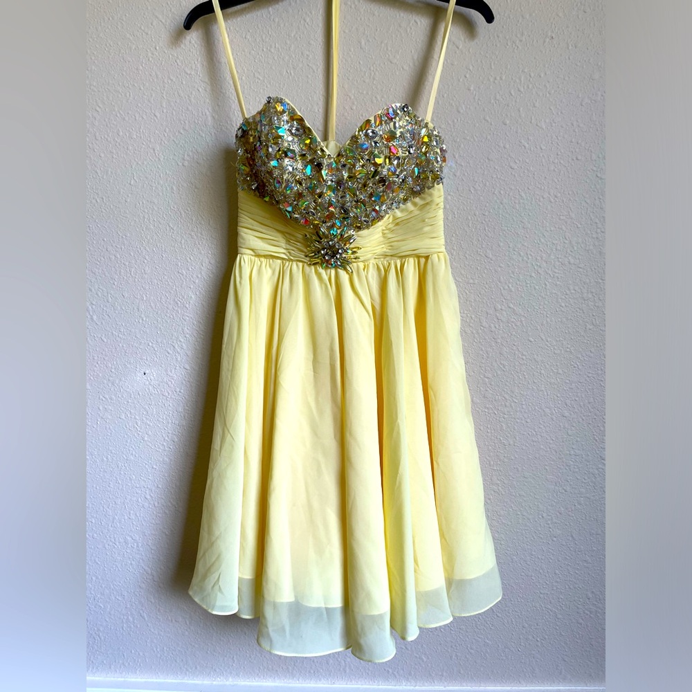 yellow style: bedazzled, solid, sweet heart cut very small diamonds are missing